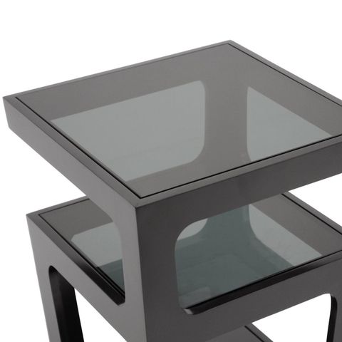 The Enduring Appeal of Clara Tables with Black Metal and Clear Glass